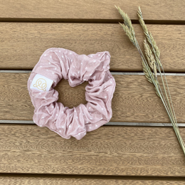 Cream-colored bamboo scrunchie with a soft, textured fabric.