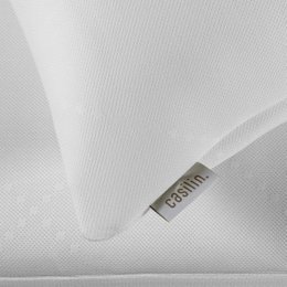  A white, rectangular pillow protector with the label "Casmin" visible. The pillow protector appears to be made of a soft, breathable material and is available in multiple sizes.