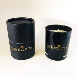 Vegan scented cylinder candle available in black, gold, and bronze colors in small, medium, large, and extra-large sizes. Made of natural ingredients.