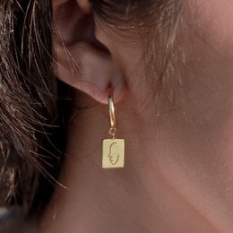 18k gold plated hoop earrings with engraved face pendant, made of 925 silver gold vermeil.
