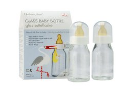 Two clear glass baby bottles with yellow nipples, 110 ml capacity, suitable for kids.
