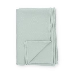 Soft, sage green throw blanket made of GOTS certified organic cotton, measuring 120x170cm.