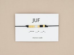 Morse code bracelet with silver, rose gold, and gold color options. Beaded bracelet with adjustable cord.