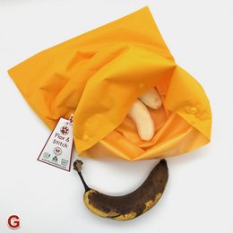 Reusable freezer bag in a variety of vibrant colors including red, orange, green, blue, and more. Made of durable, flexible material to store and freeze food items.