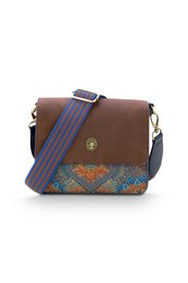 Small cross-body bag in brown with colorful floral and paisley pattern, adjustable strap, and metal hardware.
