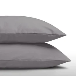 Anthracite-colored pillow cases, available in 60x70 and 80x80 sizes, made of high-quality materials for a comfortable sleep experience.