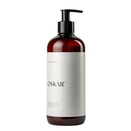 A 480ml bottle of OSKAR® hair conditioner with a pump dispenser. The conditioner is designed to nourish and condition hair.