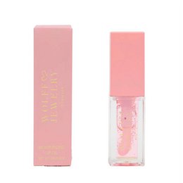  Shimmery pink lip gloss with a smooth, glossy finish.