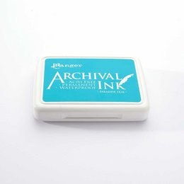 Turquoise archival ink pad for stamping and crafting, with a rectangular shape and a circular design on the surface.