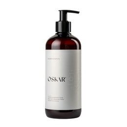 480ml bottle of OSKAR® hair shampoo. Gentle, nourishing formula for clean, healthy hair.