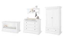 A wide, white nursery furniture set including a cot bed, changing unit, wardrobe, and wall shelf. The set features a classic, clean design with white painted wood and neutral tones.