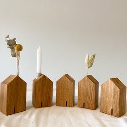 Decorative wooden houses in various styles, including candle holders, flower houses, and incense houses. Made of natural wood materials.