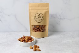 Honey roasted mixed nuts, 80g. Includes a variety of nuts such as almonds, cashews, and hazelnuts, roasted with a sweet honey glaze.