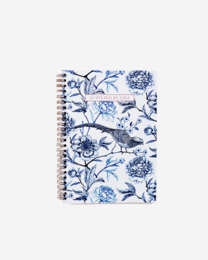 A5 spiral notebook with a luxurious toile de Jouy pattern featuring blue and white floral and bird designs. The notebook has a spiral binding and is suitable for writing, sketching, or note-taking.