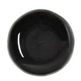 Black ceramic dinner plate with a round, simple shape.