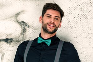 Fancy green bow tie with polka dots