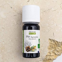 Essential oil in a glass bottle with a pine-like scent. Contains natural pine extract.
