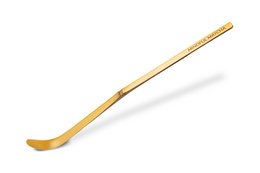 Mindful Matcha bamboo spoon, a stylish and eco-friendly kitchen tool for preparing and serving matcha tea. Features a natural bamboo handle and a golden metal scoop.