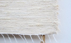 Crèmekleurig katoenen vloerkleed van medium 140/70 cm