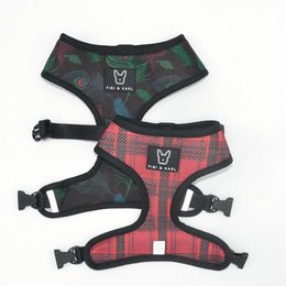 "2-in-1 dog harness with birds and skirt patterns, available in sizes S, M, L, XL. The harness features adjustable straps and a durable design for comfortable wear."