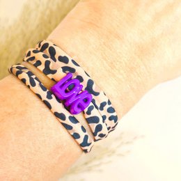  Leopard print wrap bracelet with purple love charm. Beaded bracelet with colorful charms in various shapes.