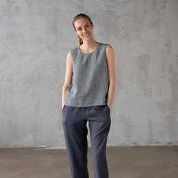 Sleeveless linen blouse in navy and white gingham pattern. Relaxed, boxy fit.