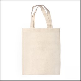 Ecru cotton shoulder bag with long handles.