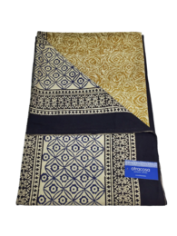 Throw blanket with a Bagru cotton fabric in a black, navy, ecru, and gold color scheme featuring a patterned border design.