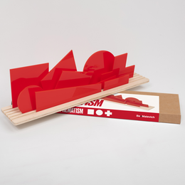 Red geometric shapes on wooden blocks, abstract Suprematist-style sculpture.