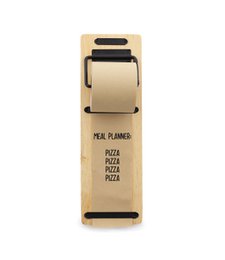 A black and tan paper roller with the text "MEAL PLANNER" printed on it. The roller appears to be made of kraft paper and has a simple, minimalist design.