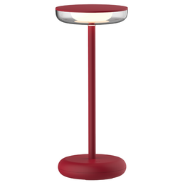 Burgundy round table lamp with tall stem, modern minimalist design, warm lighting