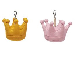Plush crown-shaped keychain in yellow and pink colors.