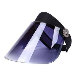 Stylish sunglasses with a black frame and a purple gradient lens. The sunglasses feature a decorative rhinestone accent on the side.