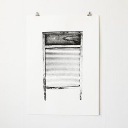 Black and white screen print of a washboard wall art piece.