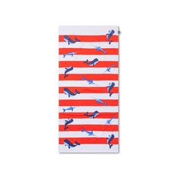  Red and white striped beach towel with ocean-themed graphics like dolphins and seashells. Made of soft, absorbent cotton. Measures 135 x 65 cm.