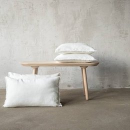Linen cushion cover in off-white with terra fringe, available in various sizes including 40 x 60 cm, 50 x 50 cm, and 30 x 40 cm.