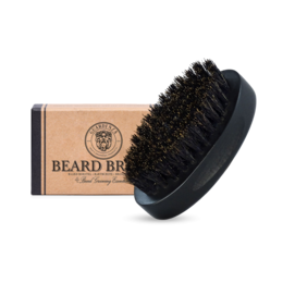 A compact, pocket-sized beard brush made of natural boar bristles to groom and style facial hair.