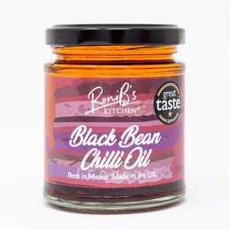 Spicy black bean chili oil with a vibrant orange color and a blend of aromatic spices. Ideal for adding heat and flavor to various dishes.
