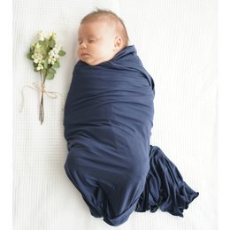 Navy blue swaddle blanket for newborn baby. Soft, breathable fabric for comfortable swaddling.