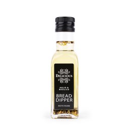 Olive oil with garlic and basil flavors, perfect for dipping bread.