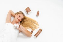 Sulfate-free hair care products for very dry hair, including shampoo, mask, conditioner, thermal protectant, and serum. Nigella Therapy hair care line.