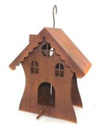 A rustic, wooden birdhouse with a distinctive witch house design. The birdhouse features a peaked roof, decorative cutouts, and a hanging loop for easy placement in the garden or yard.