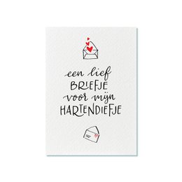 A postcard with a handwritten message in Dutch that reads "Een brief briefje voor mijn hartendiefje" which translates to "A sweet note for my sweetheart".