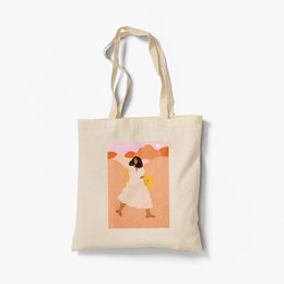 Organic tote bag with a colorful abstract illustration of a person walking. Made of durable cotton canvas with long handles for comfortable carrying.