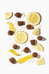  Lemon cheesecake with chocolate truffles, available in 250g, 500g, 1kg, and 3kg sizes. Rich, creamy lemon cheesecake with decadent chocolate truffles.