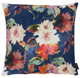 Vibrant floral cushion in navy blue, featuring large blooms in shades of red, orange, and pink. The cushion has a soft, plush texture and is suitable for use on a couch or chair.