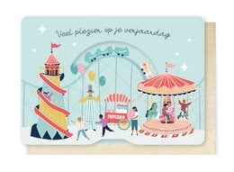 Colorful birthday card with a carnival-themed illustration featuring a Ferris wheel, carousel, and people enjoying the festivities. The text on the card says "Veel plezier, je verjaardag" which means "Have fun on your birthday" in Dutch.
