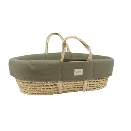 A forest green padded moses cover made of muslin fabric, suitable for a baby's bedlinen.