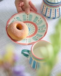 "Ceramic snack plate, round shallow dish, pink coral rim, turquoise geometric pattern, tapas serving"