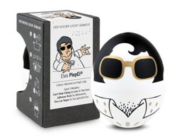 A white egg-shaped timer with a black and white design, featuring sunglasses and a stylized Elvis-inspired image. The timer is designed to help with cooking and baking tasks.